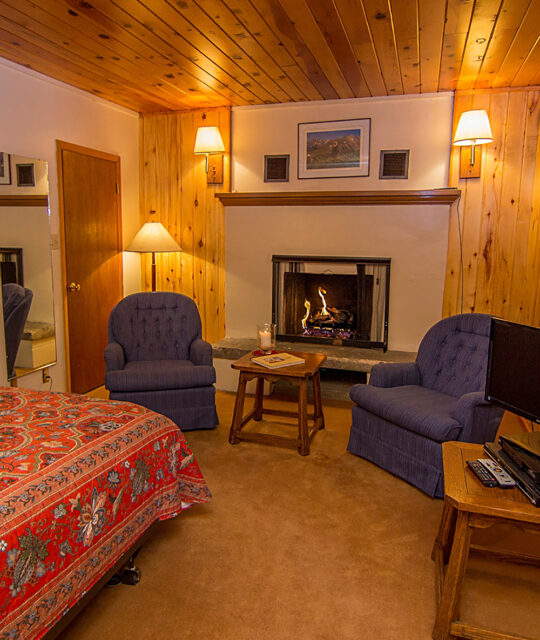 Fireplace in bedroom at the Brownell Chalet