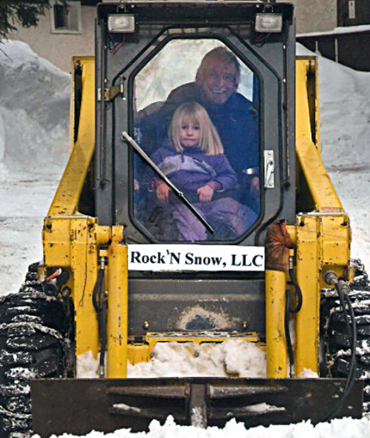 Bill Engle and Eliza snow plowing