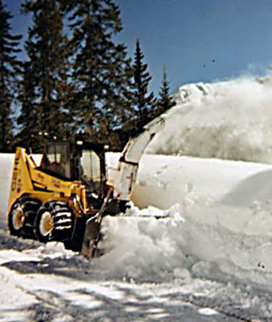 Snow plowing with blower