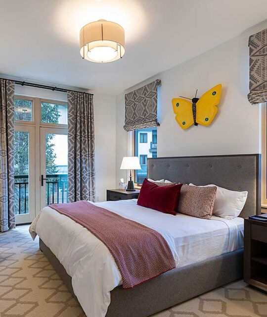 Condo bedroom and balcony.