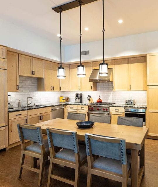 Modern rustic condominium kitchen and dining
