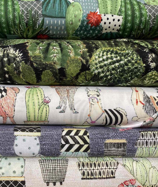 Cactus and alpaca motif printed fabrics.