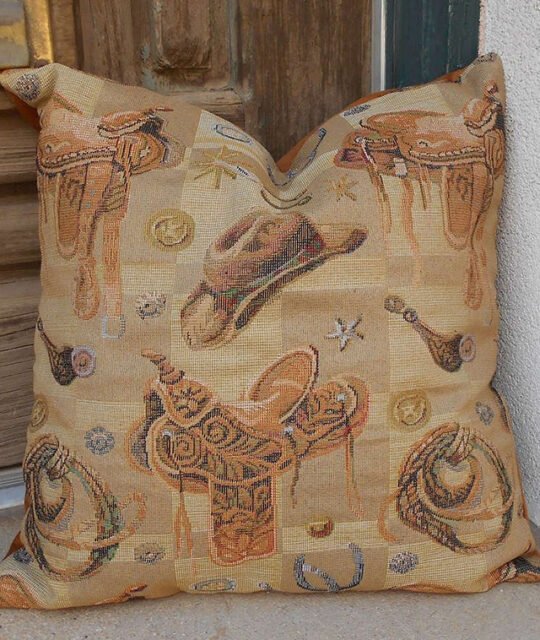 Western cowboy motif pillow cover fabric.