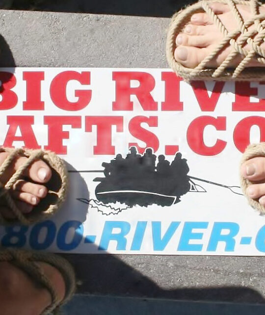Big River Rafts sign and sandals.