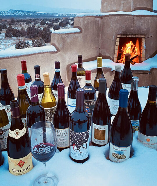 Taos Winter Wine Festival wine selection in the snow.