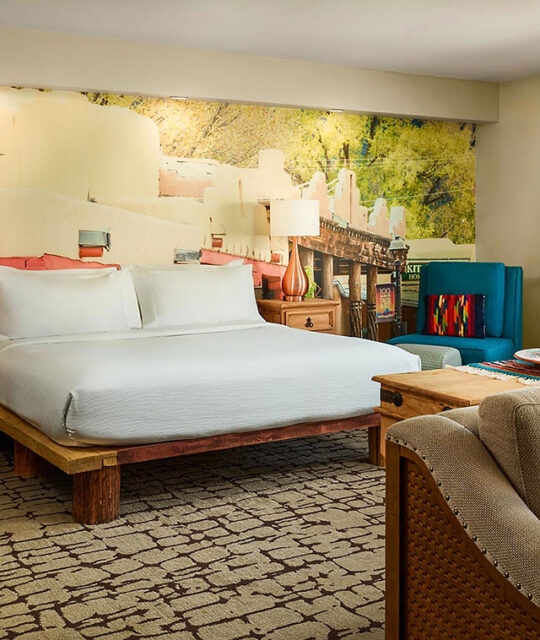 Southwest inspired hotel king bedroom.