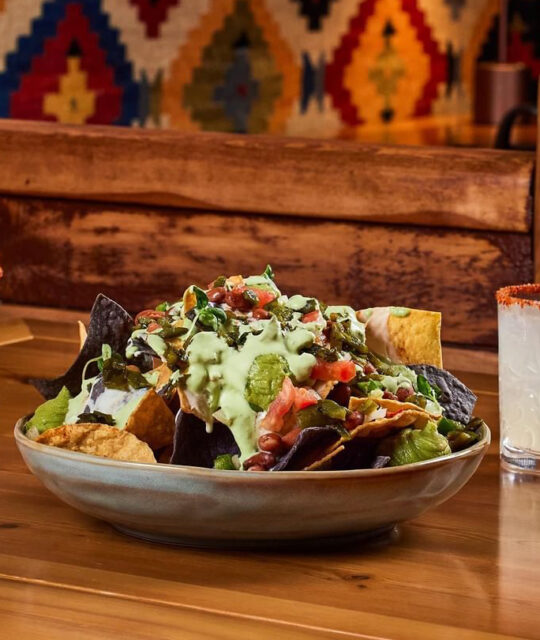 Large nachos with poblano topping.