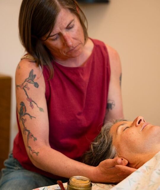 MeadowLark Massage Ali Pasquill working on a client with personalized therapeutic massage.