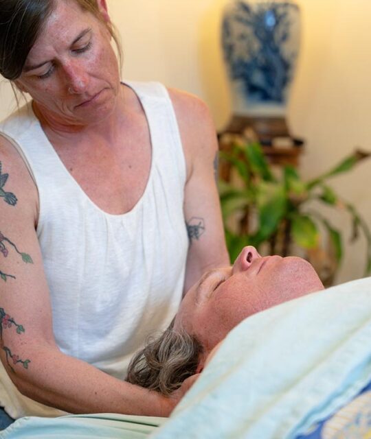 MeadowLark Massage Ali Pasquill working on a client with personalized therapeutic massage.