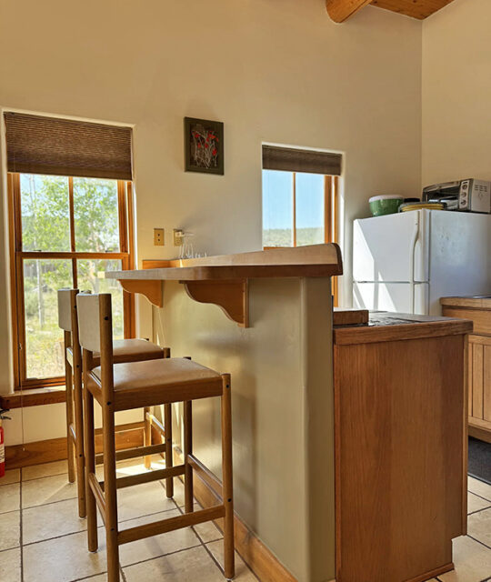 Kitchen counter and stools in a rental casita.