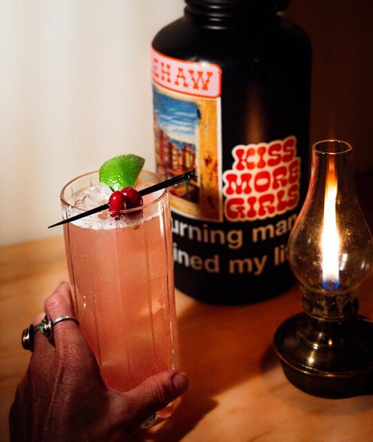 Bearberry Mule cocktail and small lamp.