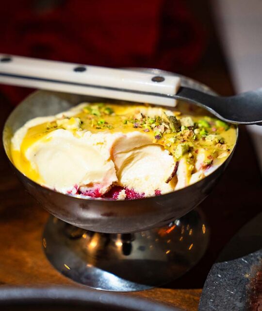Ice cream with pistachio's and spoon