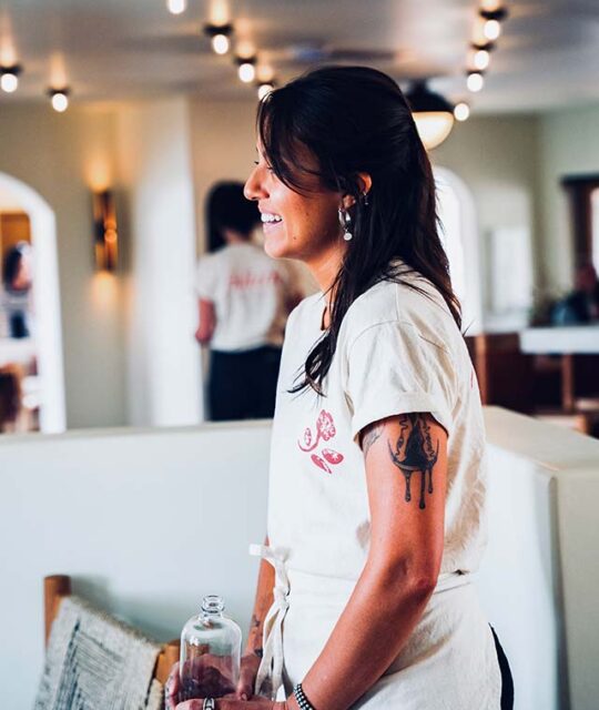 Smiling waitstaff at restaurant Juliette in Taos.