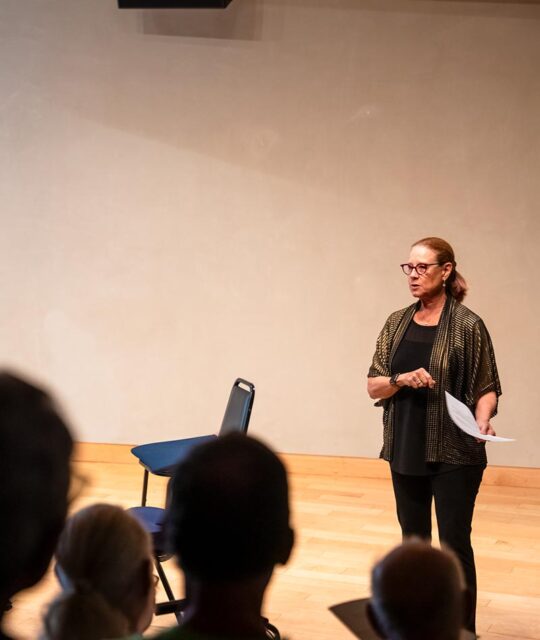 A Chamber musician speaking to the audience.