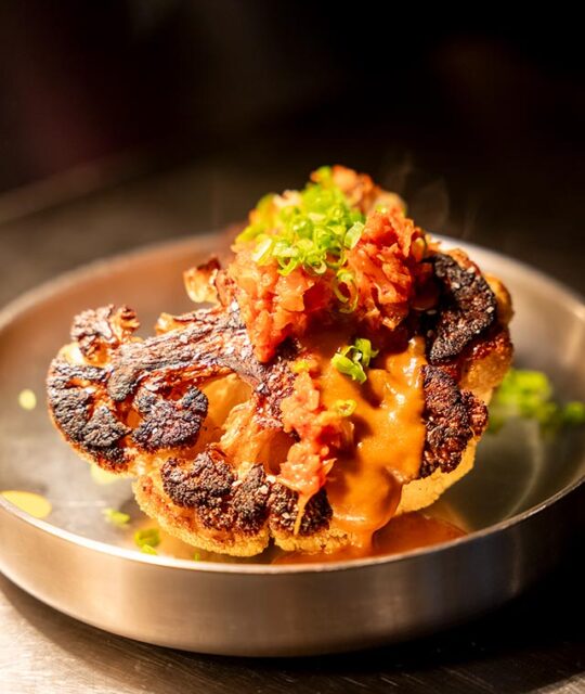 roasted cauliflower, fermented red pepper, kimchi prepared by chef Kevin Sousa of Suchness