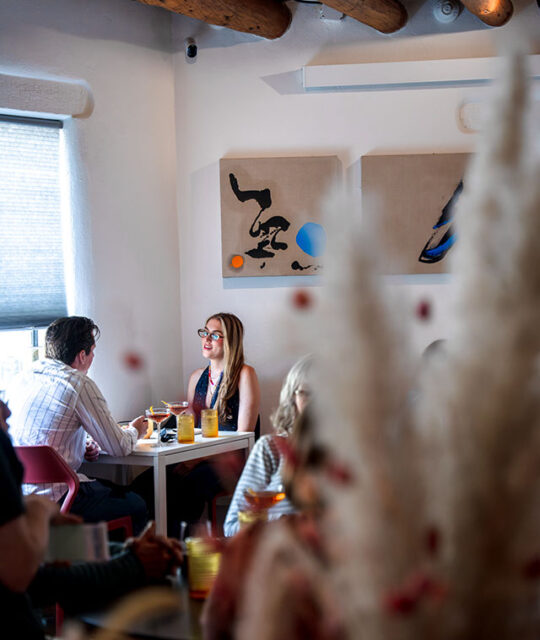 Couple dining at Suchness in Taos